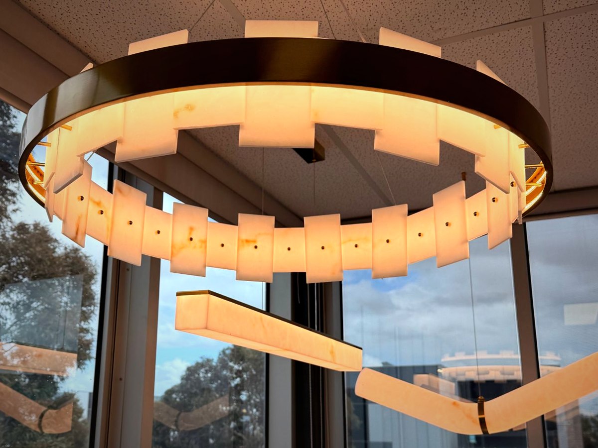 Illuminated alabaster ring chandelier
